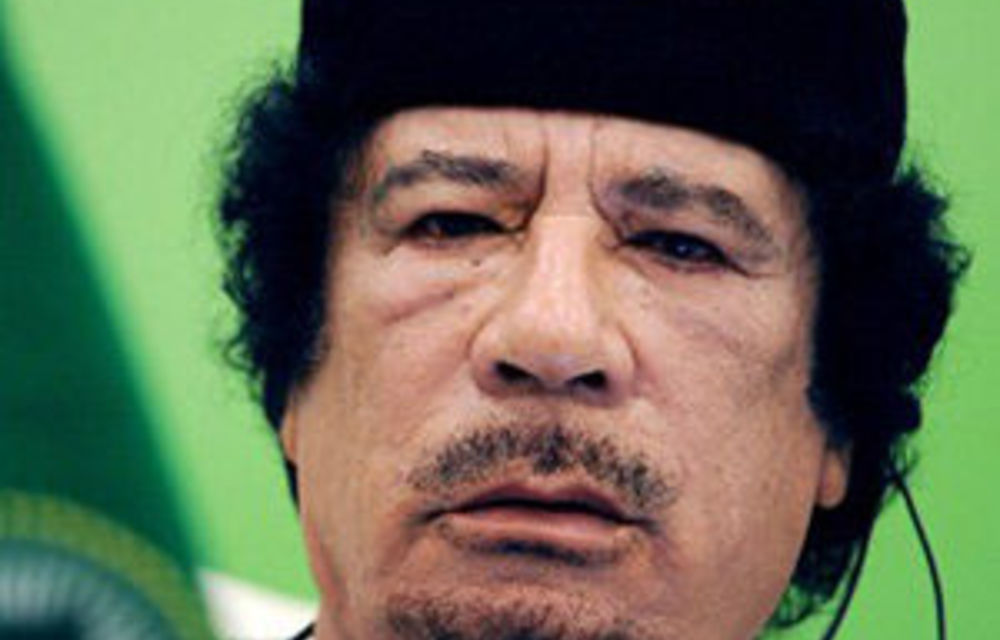 Gaddafi forces launch new attacks, talks continue