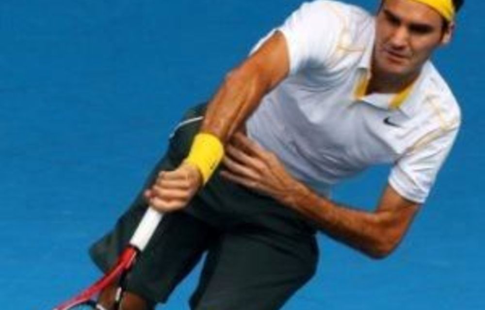 Federer stunned by inspired Tsonga