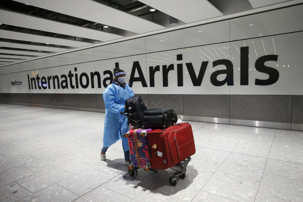 South Africa says UK red list travel decision on new Covid variant is premature